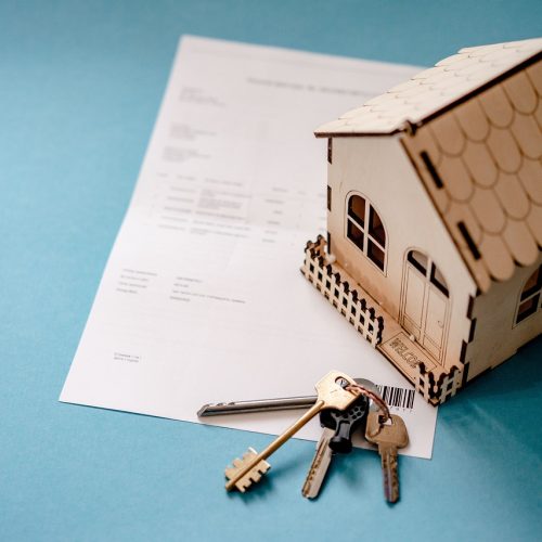 Real estate professionals coordinating tenant screening and lease management outsourcing.